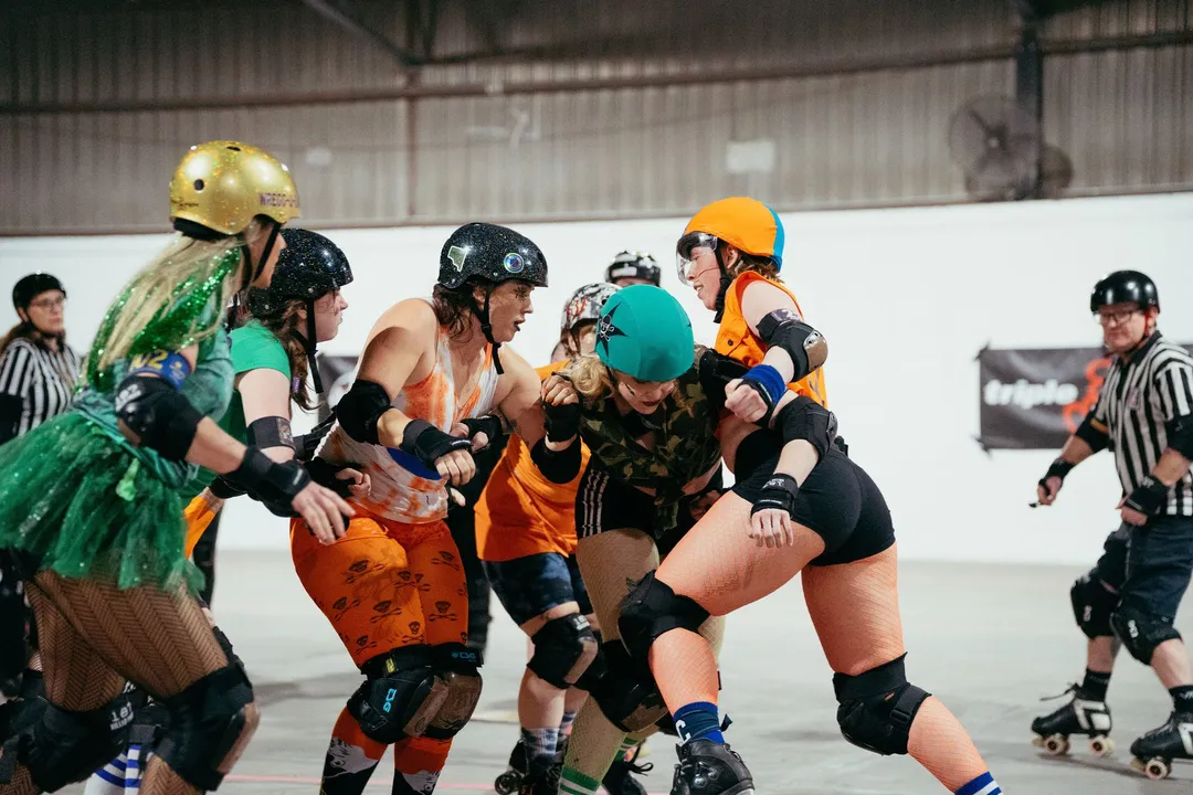 The pack braces as a jammer comes through