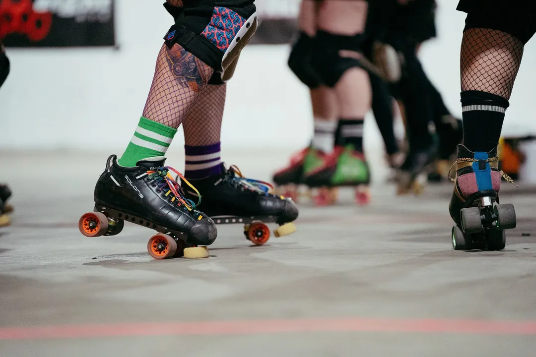 Roller skates and fishnets on the track
