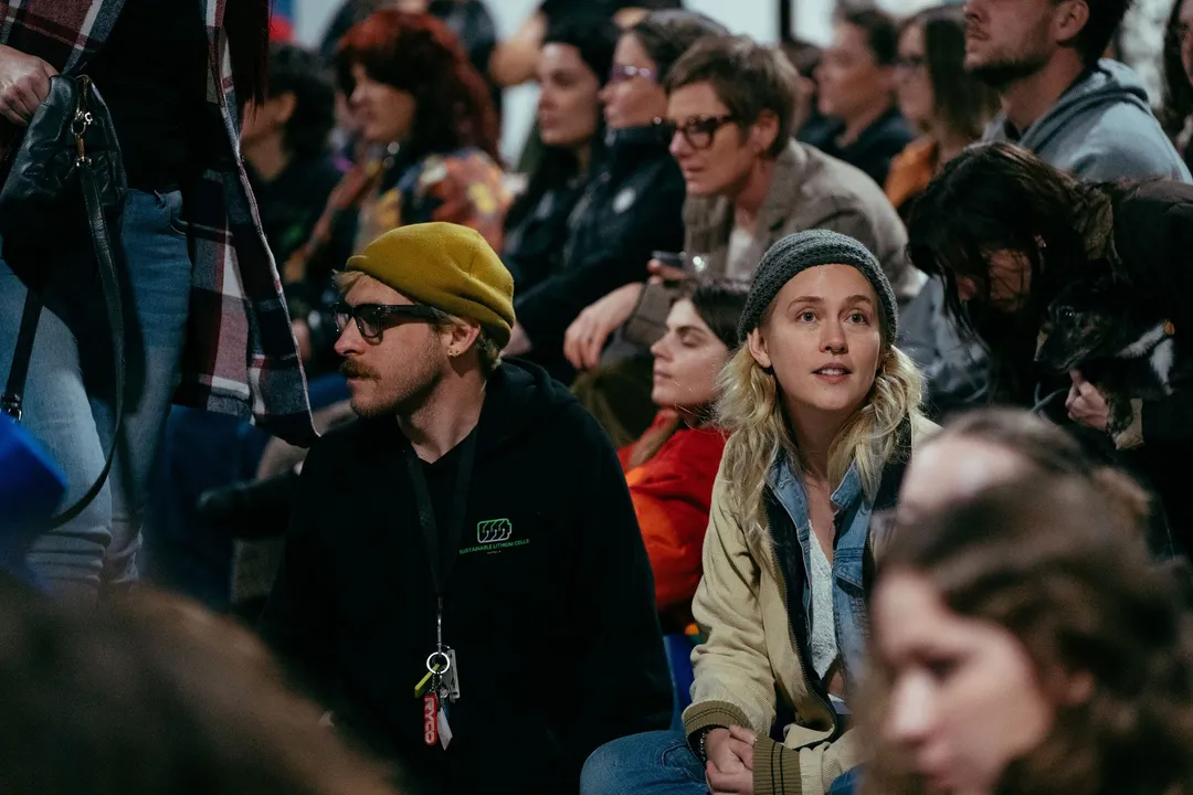 The crowd rinkside, watching the bout